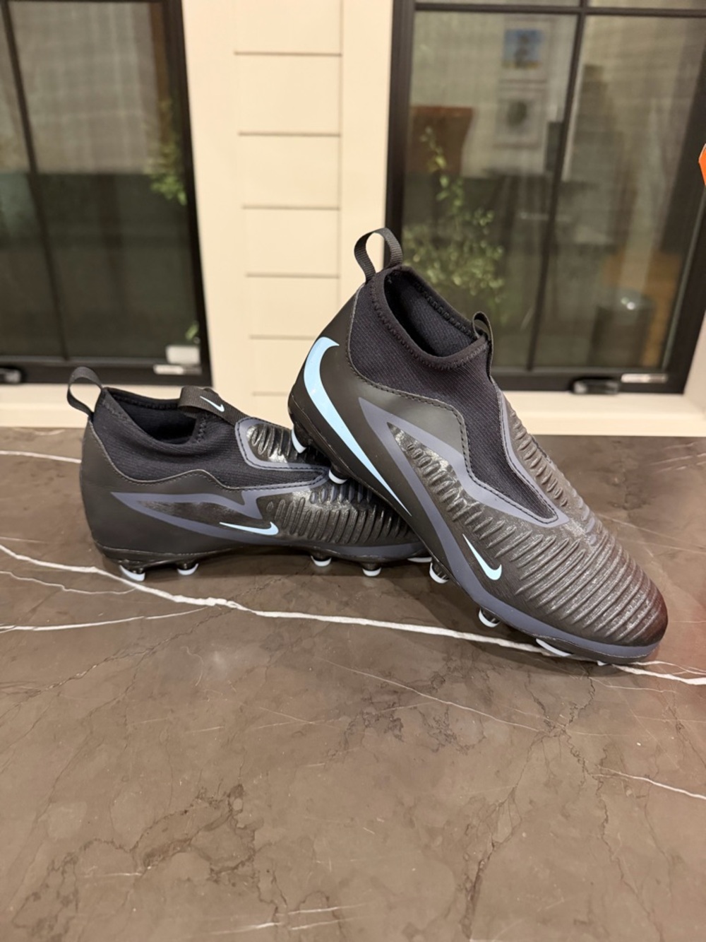 Brand new, never worn 4Y Nike Jr Phantom Soccer Cleats